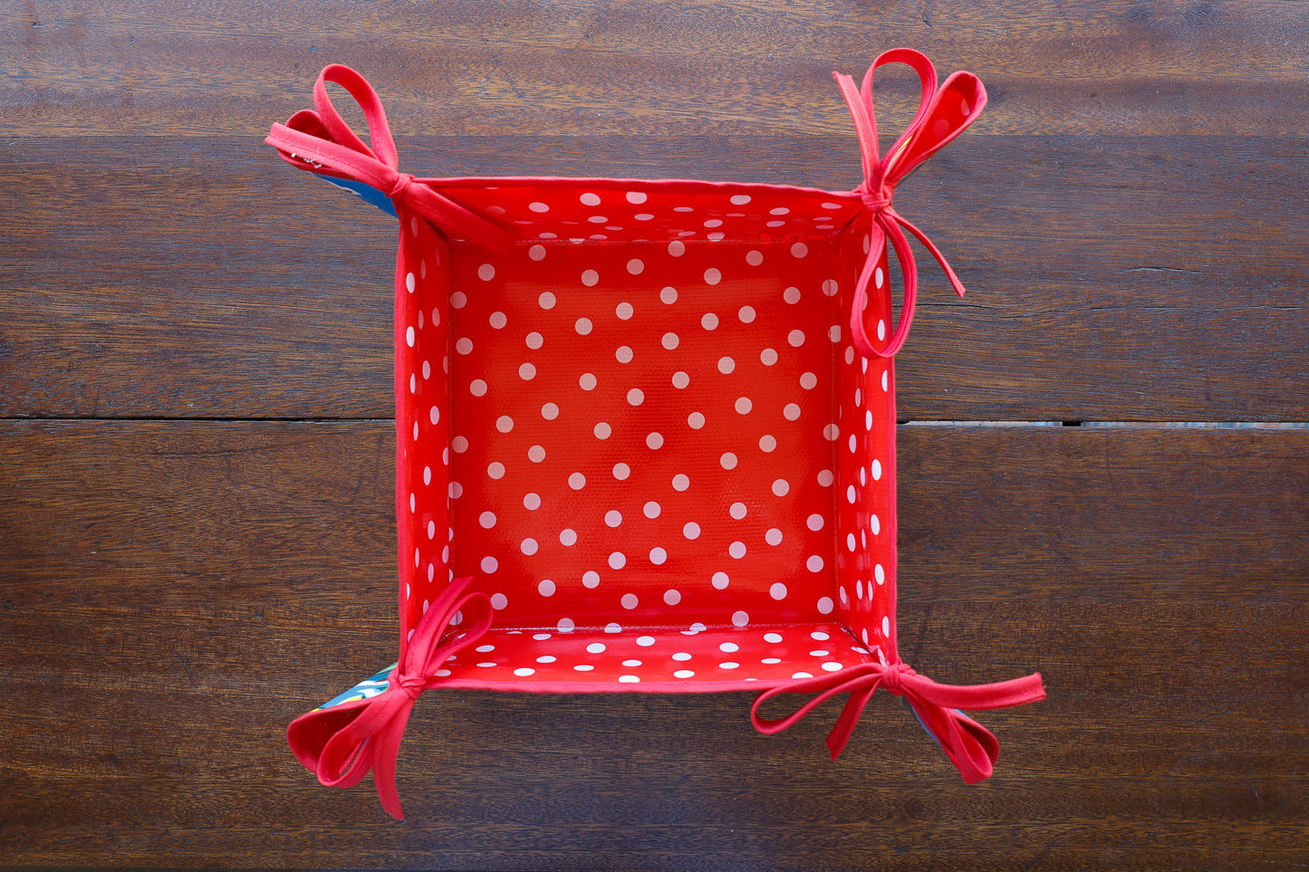 Reversible Oilcloth Basket in Blue Hibiscus and White on Red Polka Dot
