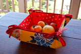 Reversible Oilcloth Basket in Yellow Hibiscus and White on Red Polka Dot