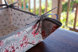Reversible Oilcloth Basket in Silver Cherry Blossom and Silver on White Polka Dot