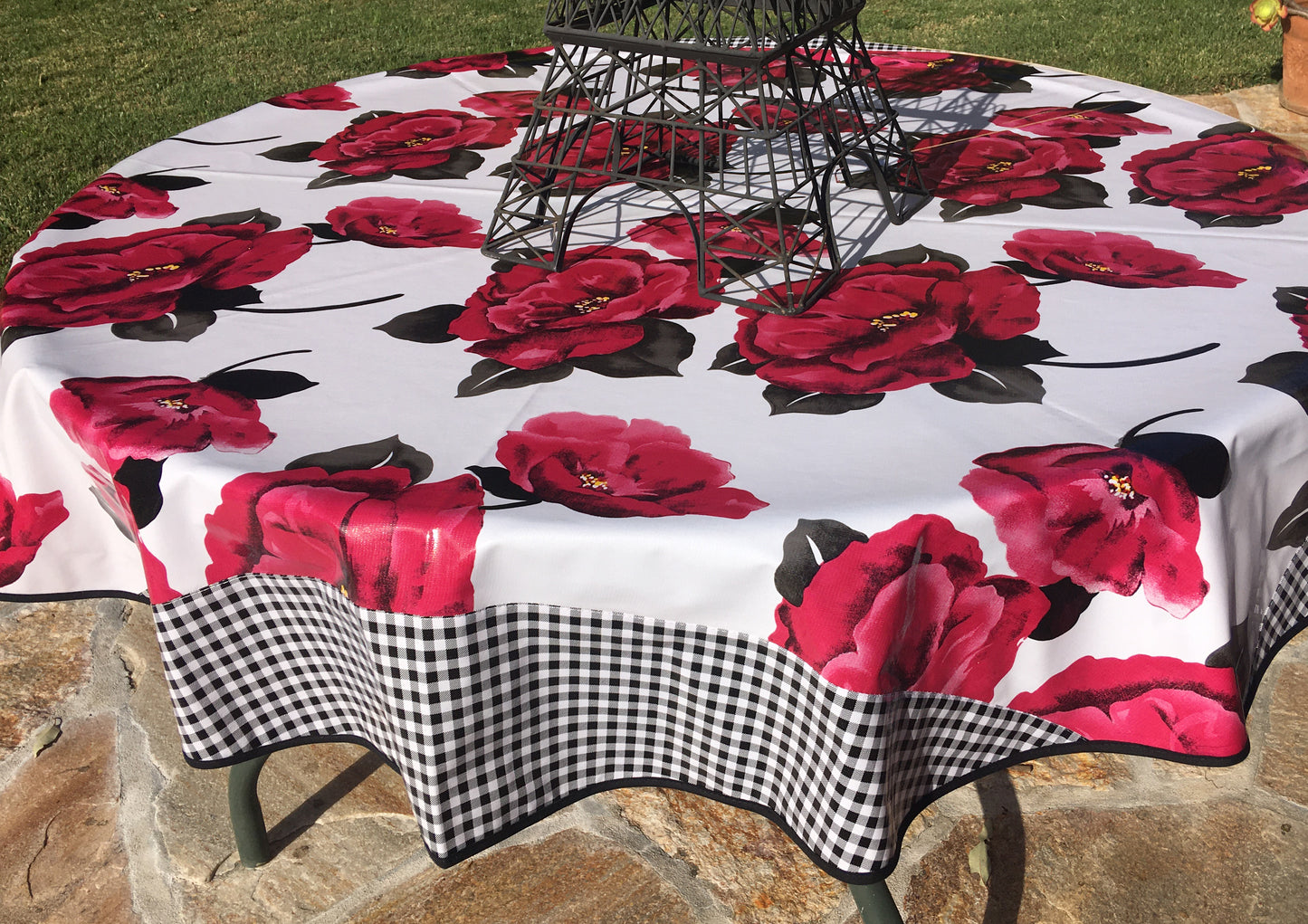 Round Magenta Blossom Oilcloth Tablecloths with Black Gingham Borders